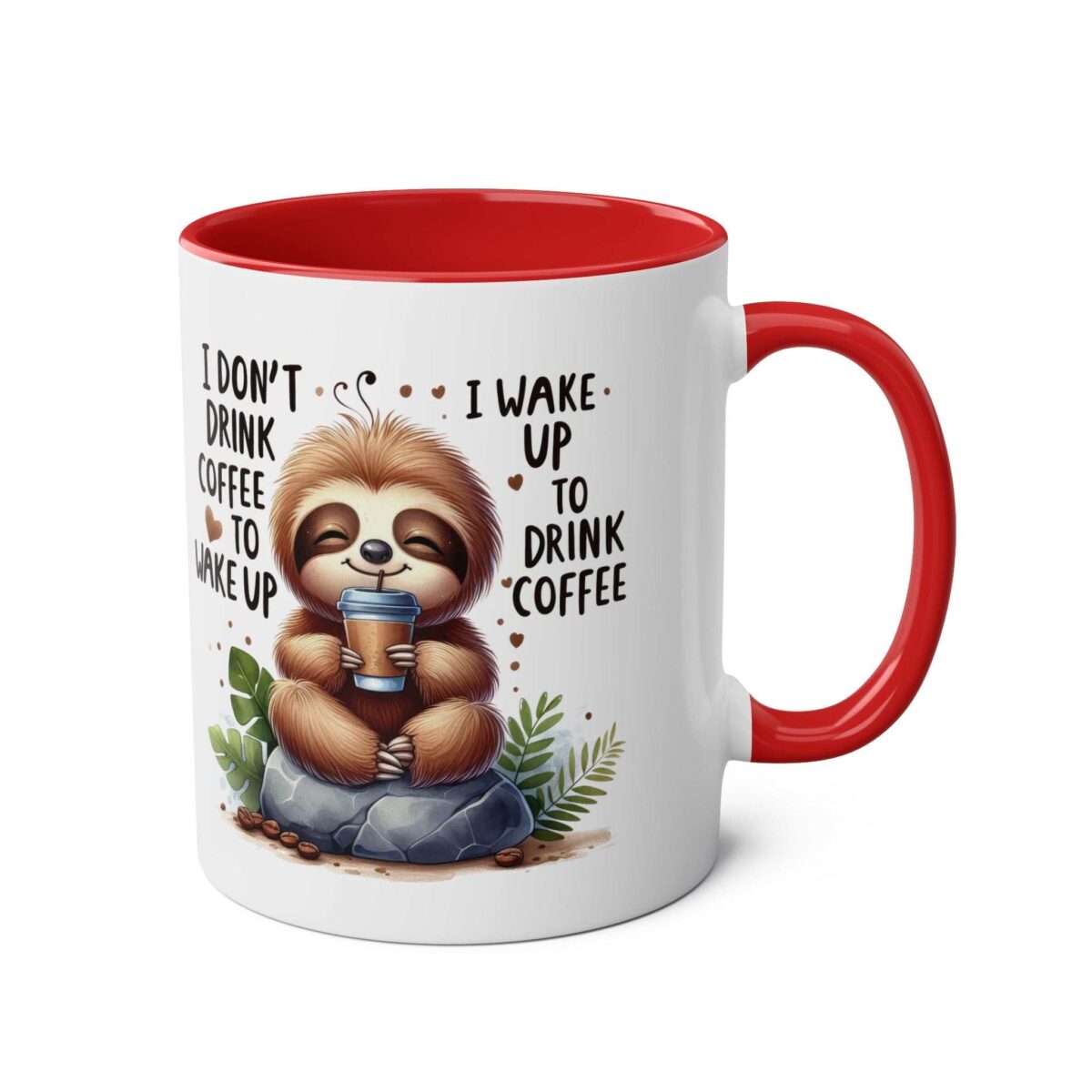 White ceramic mug with a red interior and handle, featuring a cute sloth holding a coffee cup with the text "I don't drink coffee to wake up. I wake up to drink coffee."