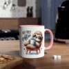 A white ceramic mug with a pink handle and rim, featuring a cartoon sloth enjoying coffee.