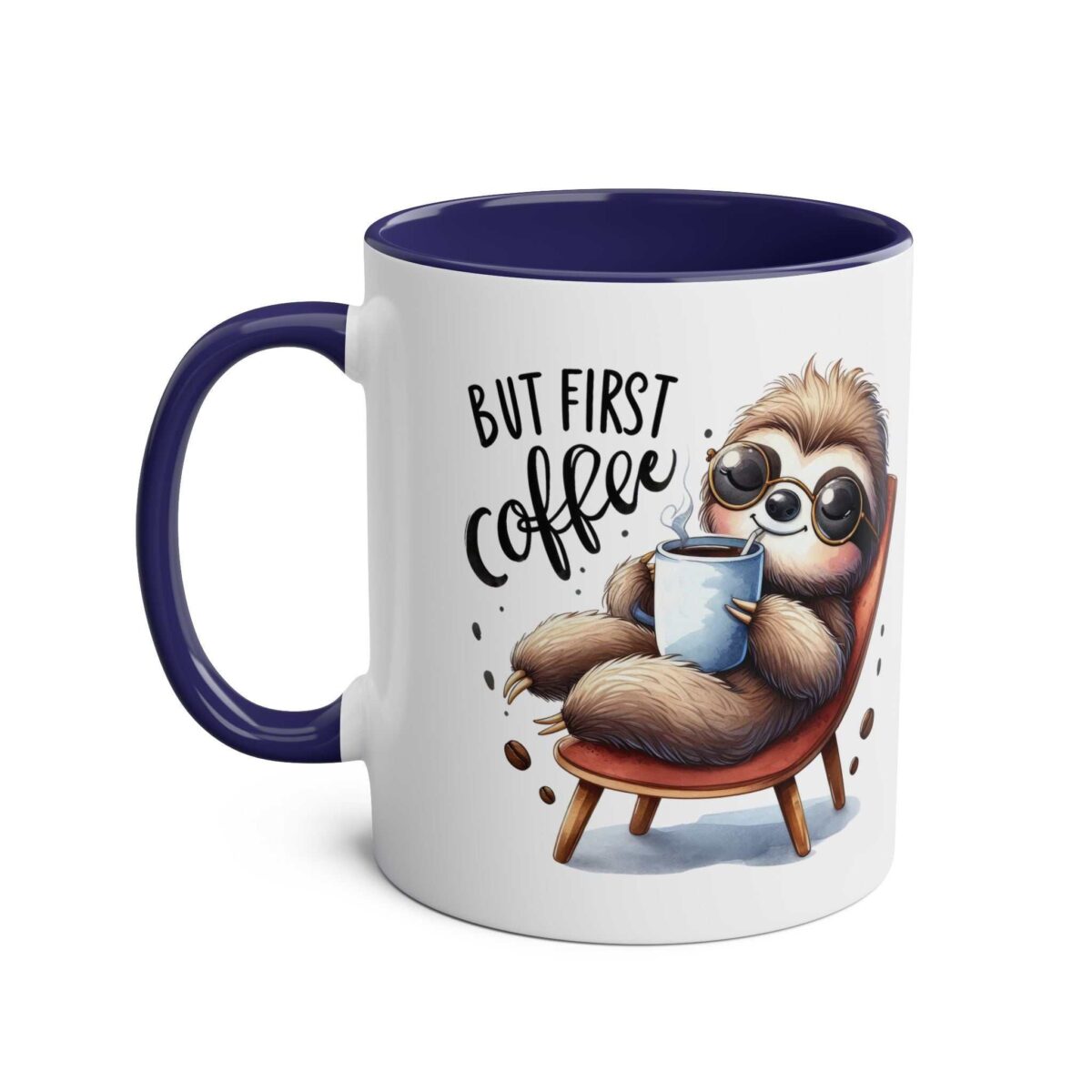 A white ceramic mug with a navy blue handle and interior, featuring a cute sloth illustration enjoying coffee.