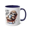 White mug with navy blue handle and interior, featuring a cartoon sloth wearing sunglasses and holding a coffee cup.