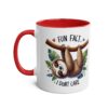 White ceramic mug with a red interior and handle, featuring a cartoon sloth hanging from a branch.