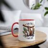 White ceramic mug with red handle and rim, featuring a cute sloth hanging from a branch with leaves and the text "FUN FACT, I DON'T CARE".