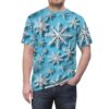 White 3D paper-cut snowflakes cover this oversized full print tee, on a bright blue background.