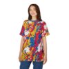 Red, yellow, blue, and white paint splatters cover this graphic streetwear tee, with black accents and a dynamic abstract design.
