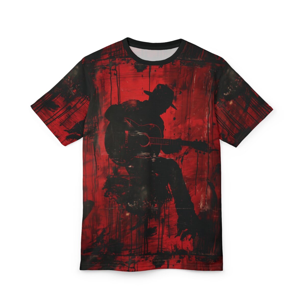 Black ink splatters and streaks cover this patterned tee shirt, with a silhouette of a musician playing a guitar on a red background.
