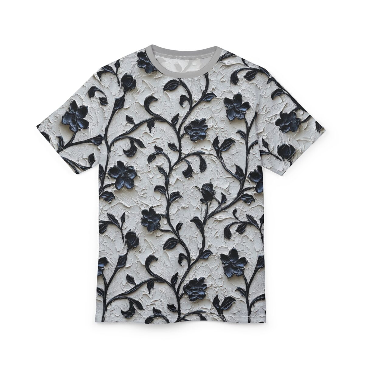 Textured black floral vines and blooms cover this seamless pattern tee, on a raised white stucco-like background.
