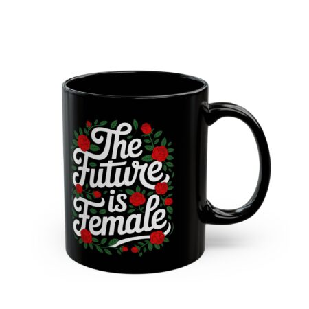 Black ceramic mug with white "The Future Is Female" text surrounded by red roses and green leaves graphic.