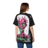 Pink and green alien with bulging eyes and tentacles emerges from dark water, surrounded by black and white abstract shapes.