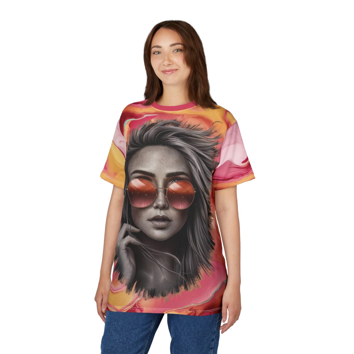Swirling pink, yellow, and orange abstract patterns surround a grayscale portrait of a woman with sunglasses on this tee shirt.