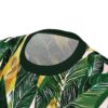 Lush green, yellow, and pale pink banana leaves with white veins cover this 3D graphic t-shirt with a tropical vibe.