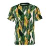 Deep greens, golden yellows, and pale pinks in a dense banana leaf pattern cover this sublimation graphic tee for a vibrant tropical feel.