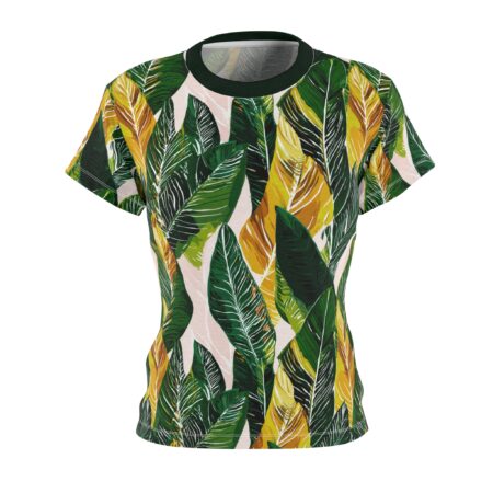 Tropical all over print t-shirt featuring lush green and yellow palm leaves with white detailing on a pale pink background.