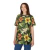 Black t-shirt with seamless tropical floral print, vibrant orange and yellow hibiscus flowers, lush green leaves, sublimation tee.