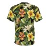 Black crewneck tee, vibrant tropical floral pattern, yellow hibiscus, orange hibiscus, white lilies, lush green leaves, seamless print.