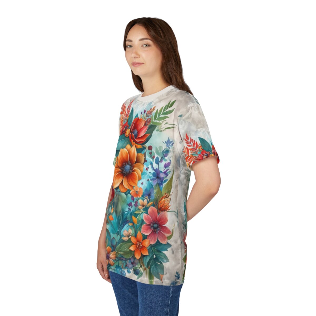 Vibrant all over print sublimation tee featuring an intricate floral design with orange, red, and blue flowers and green leaves.