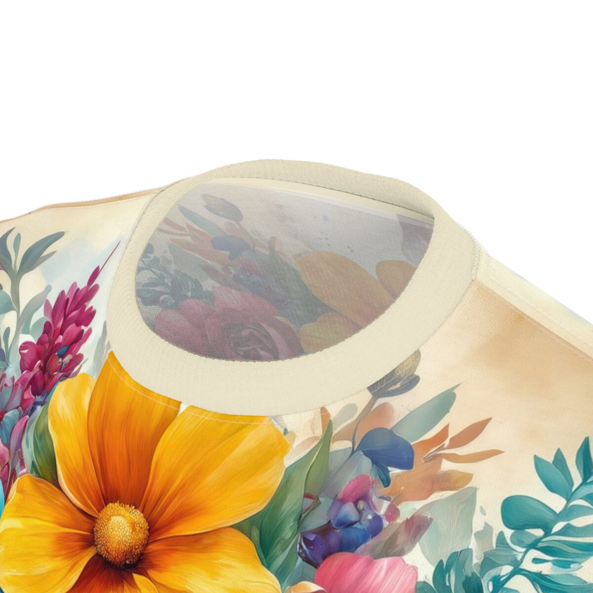 Vibrant all over print sublimation tee featuring a painterly floral design with large orange flowers and blue accents.
