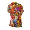 All over print sublimation tee featuring a vibrant, seamless wrap around graphic of assorted colorful flowers and lush green foliage.