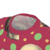 Red background with yellow and green polka dots, and detailed skull graphics cover this sublimation graphic tee.