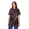Fiery orange and yellow lava flows against a dark blue and black textured background cover this patterned tee shirt, depicting a volcanic landscape.