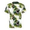 Watercolor green T-Rex heads and foliage cover this patterned tee shirt with a prehistoric vibe.