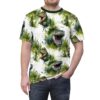 Watercolor green T-Rex heads and foliage cover this sublimation graphic tee with a prehistoric vibe.