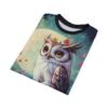 Teal, yellow, and purple hues depict a whimsical owl with a floral crown and large, expressive eyes, set against a pale moon and a starry, dark blue sky with scattered pink flowers.