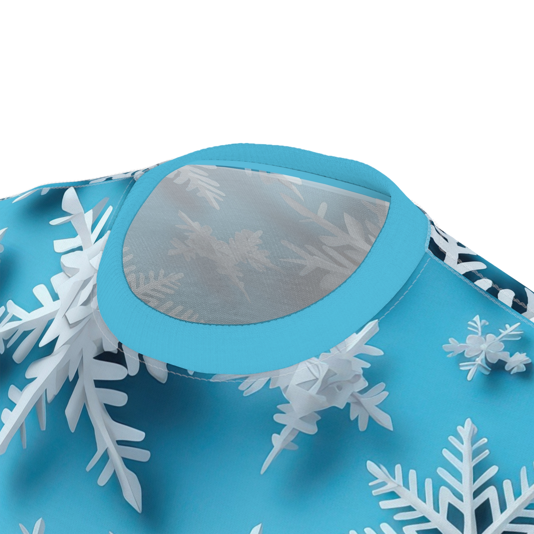 Crisp white 3D snowflakes cover this bright blue t-shirt, depicting a festive winter scene.