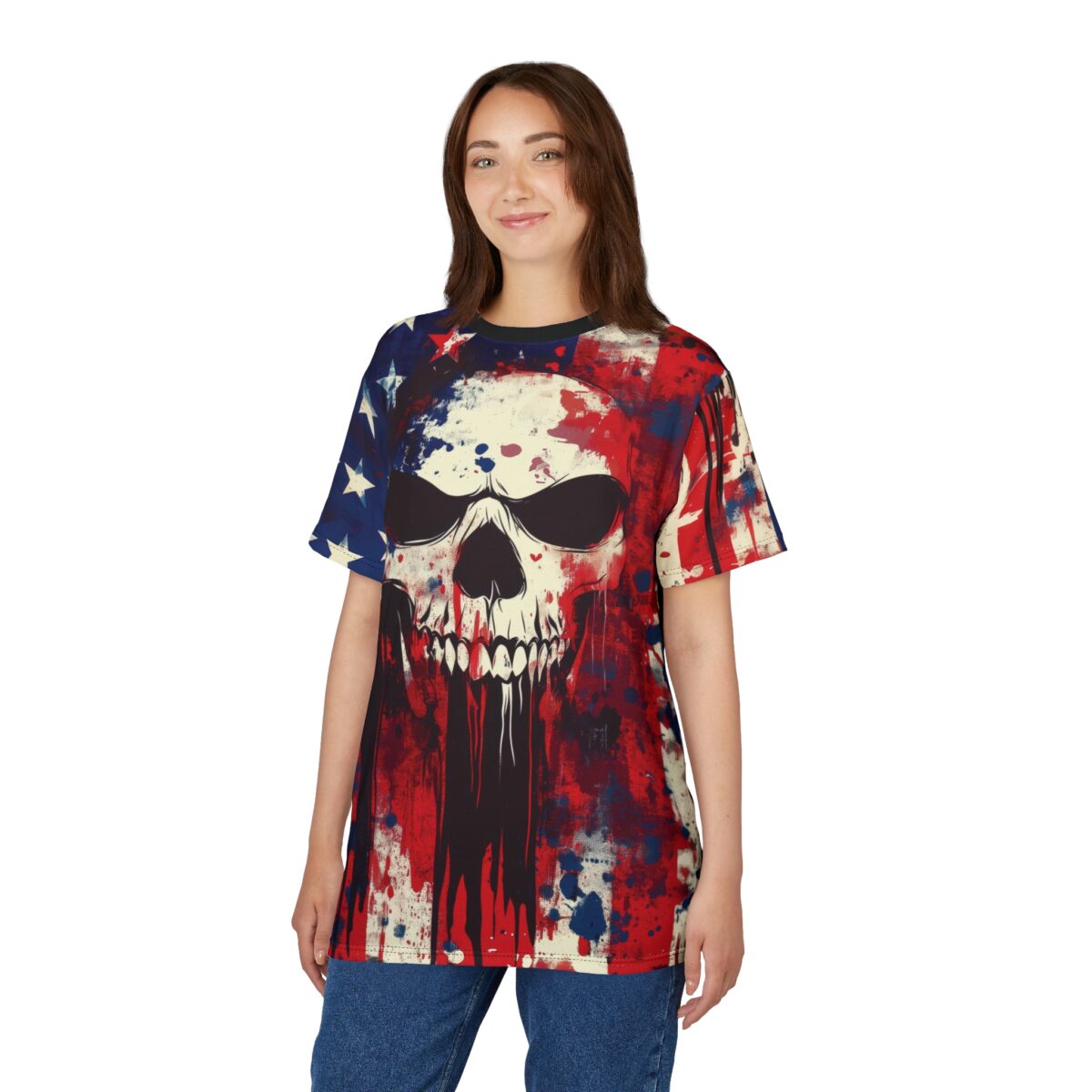 A smiling woman wearing a short-sleeved t-shirt featuring a grunge American flag and skull design. She stands against a white background.