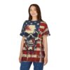 A smiling woman wearing a distressed American flag t-shirt with a stylized skull design, paired with blue jeans against a white background.