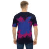 Bold blue and magenta paint splatters cover this sublimation graphic tee, set against a dark navy background with textured edges.