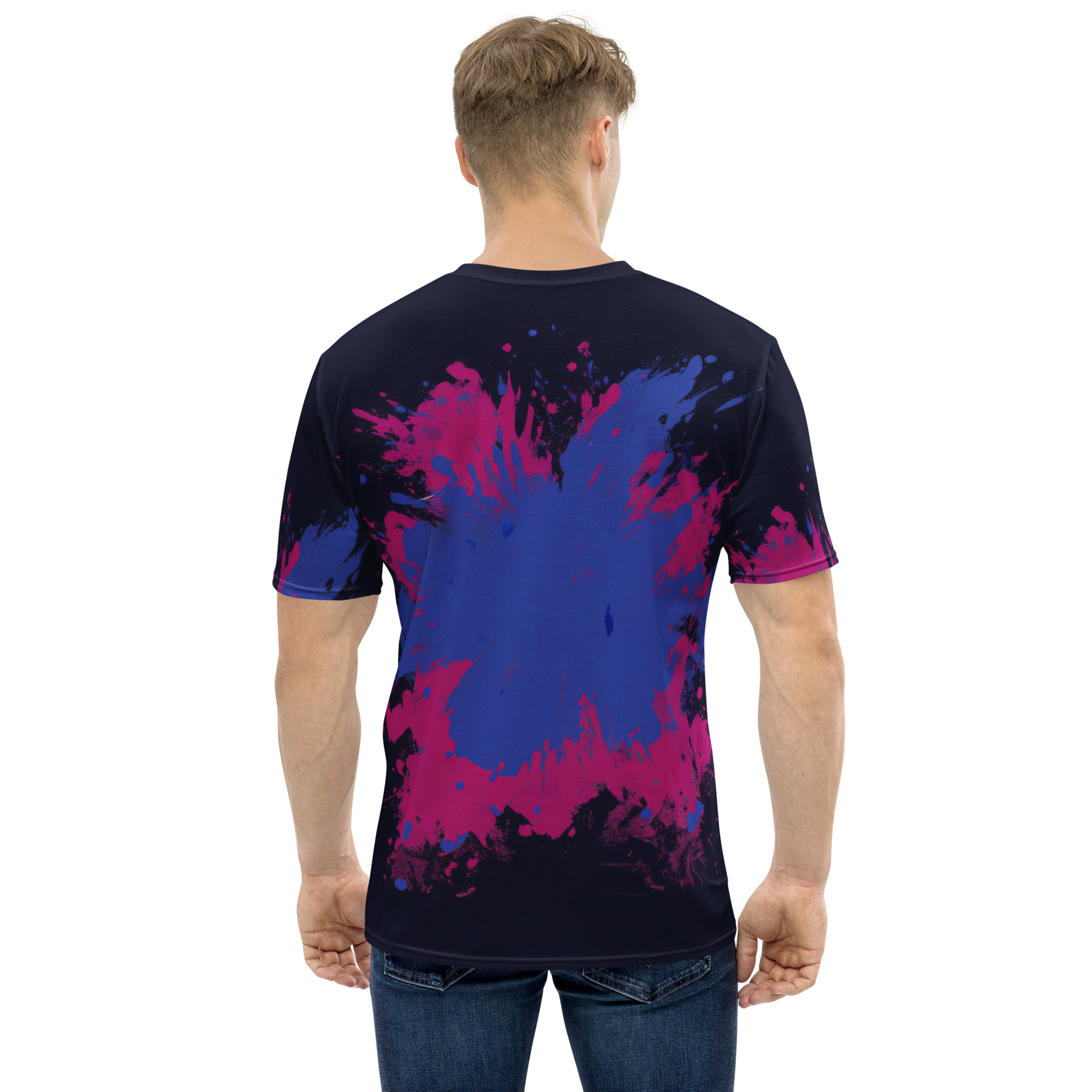 Bold blue and magenta paint splatters cover this sublimation graphic tee, set against a dark navy background with textured edges.