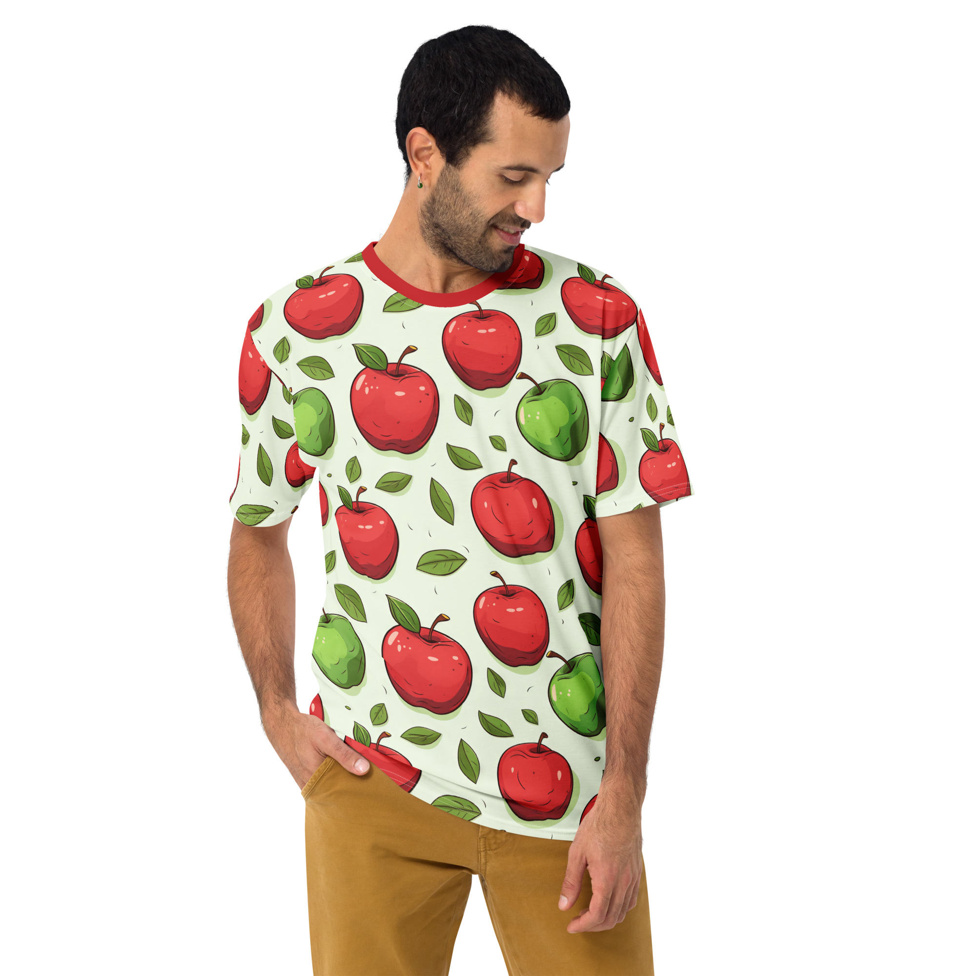Red and green apples with scattered leaves cover this all over print apparel, on a light green background.