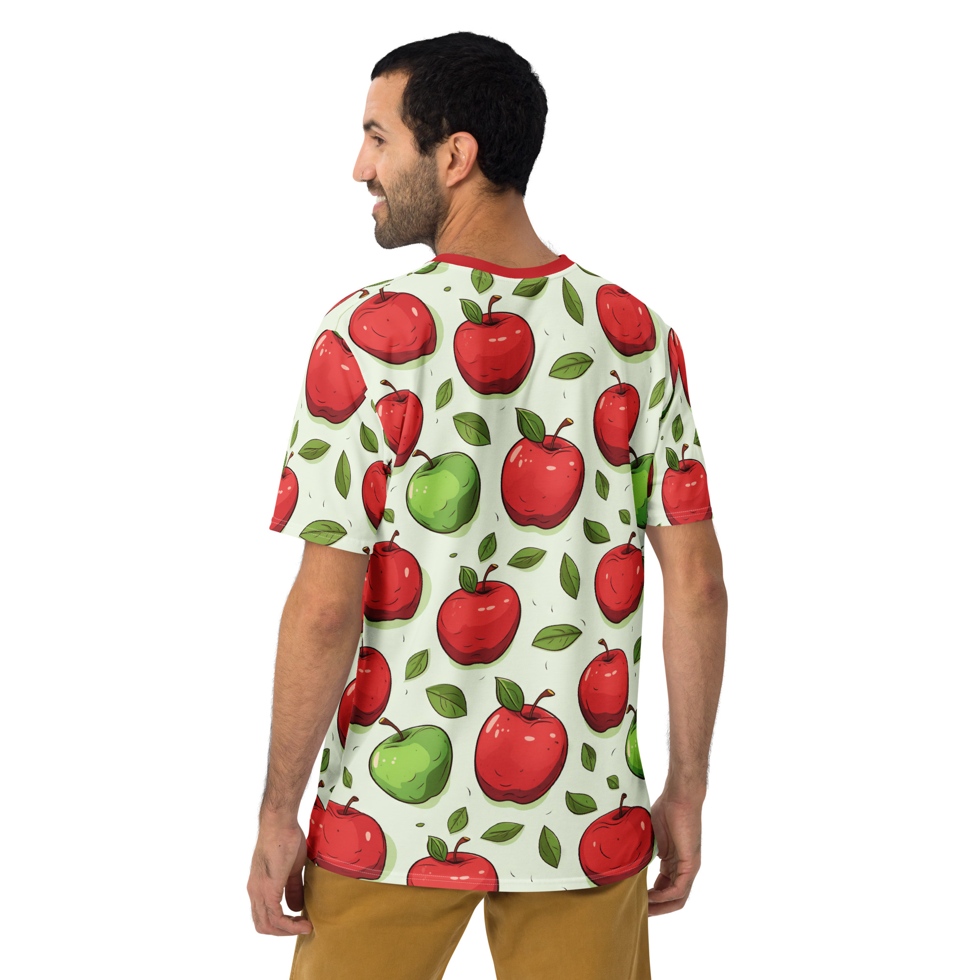 Red and green apples with leaves fill this patterned tee shirt, with a light mint background.