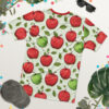 Red and green apples with leaves cover this all over print apparel, on a light green background with subtle curved lines.