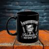 Black ceramic coffee mug with a white graphic featuring a barbecue grill and the text "If Dad Can't Barbecue It No One Can".