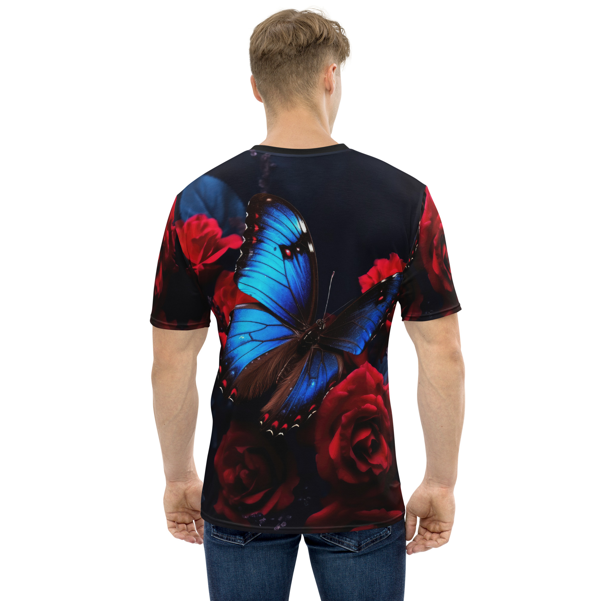 Vivid blue butterflies and deep red roses cover this oversized full print tee, set against a dark, moody background.