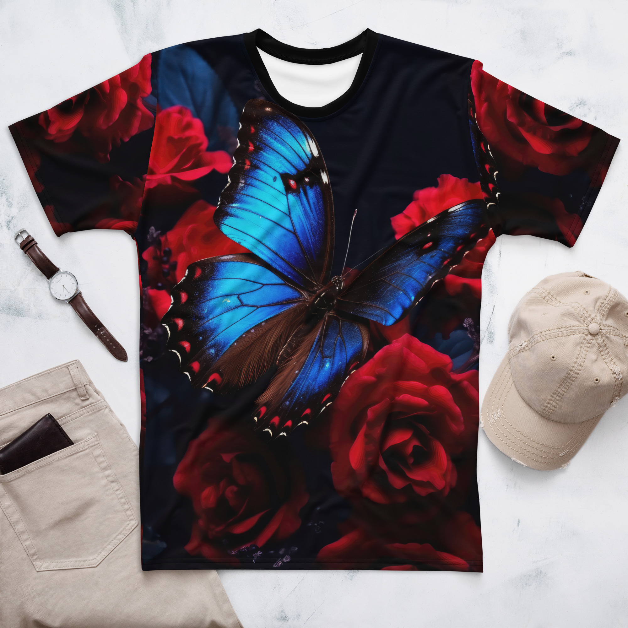Vibrant blue butterfly wings with black details and red rose petals cover this full print shirt, set against a dark background.