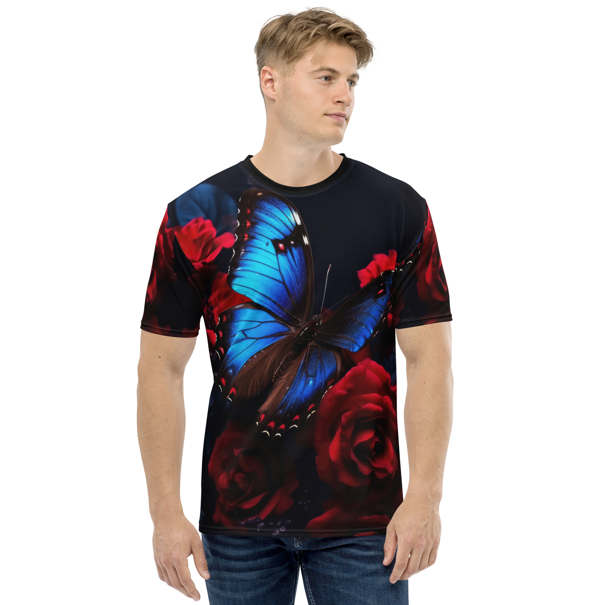 Vibrant blue butterflies and deep red roses cover this patterned tee shirt, set against a dark, moody background.