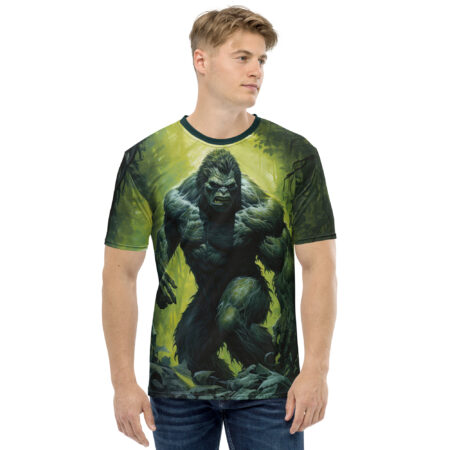 Men's all over print sublimation tee featuring a detailed graphic of Bigfoot in a vibrant green forest.