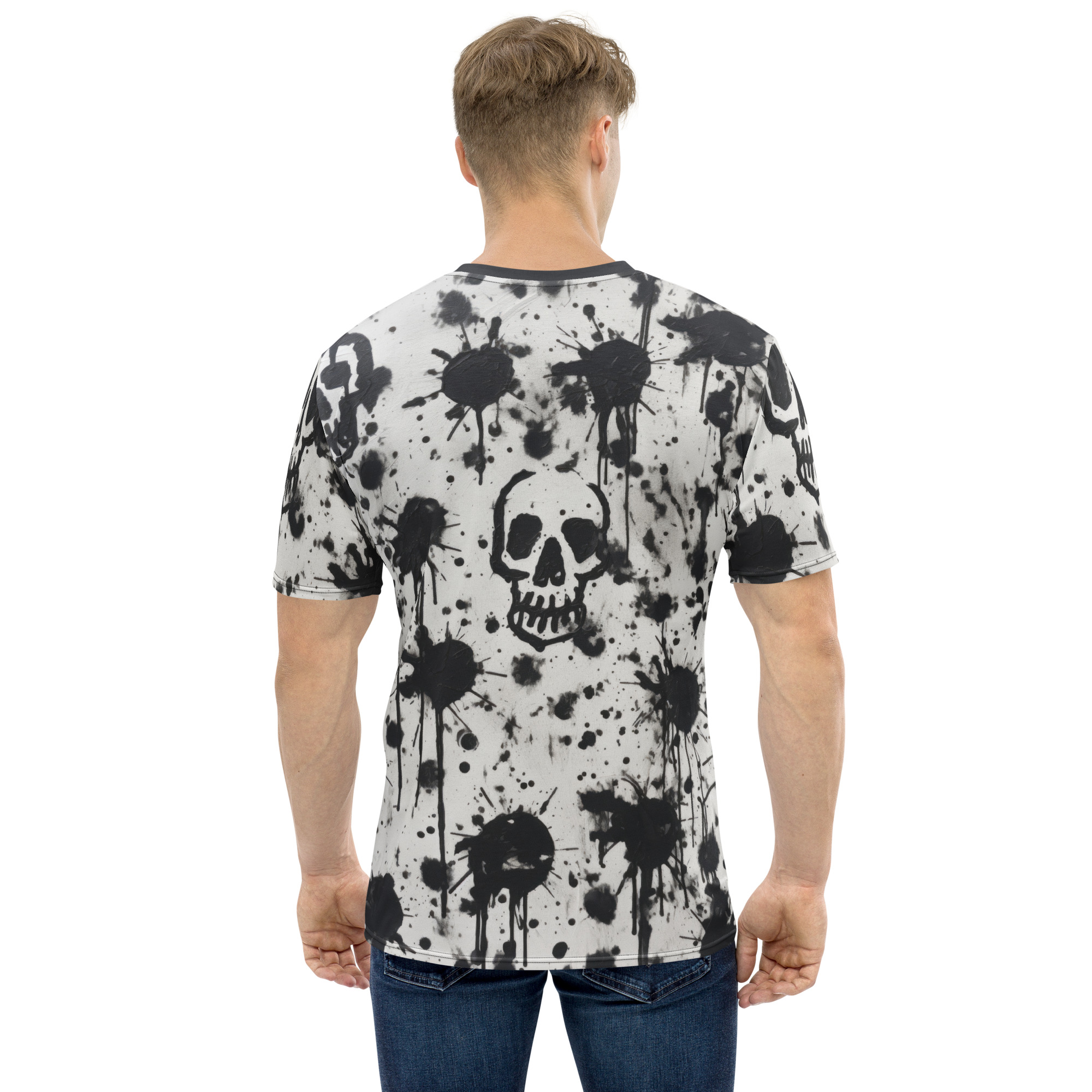 Black ink splatters and distressed skull graphics cover this seamless pattern tee, with drips and splashes on a light gray background.