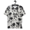 Black and white splatter paint and skull graphics cover this patterned tee shirt, featuring dripping ink effects and abstract details.