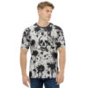 Black paint splatters and drips cover this all over print t-shirt, featuring abstract skull designs.