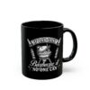 Black coffee mug with white text and graphics depicting a barbecue grill and skewers.