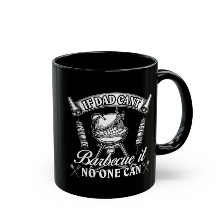 Black coffee mug with white text and graphics depicting a barbecue grill and skewers.