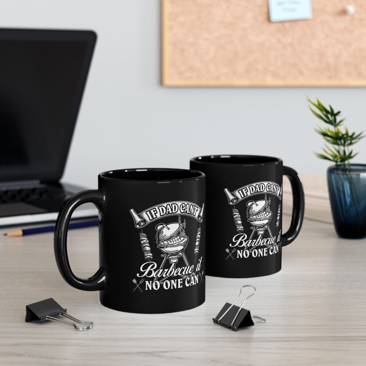 Black coffee mug with white graphic of a barbecue grill and "If Dad Can't Barbecue It No One Can" text.