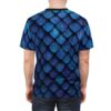 Deep blue, iridescent scales cover this all over print apparel, mimicking the texture of a mythical creature's hide.