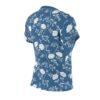 White floral branches and large peony-like flowers cover this all over print apparel, set against a deep blue background.