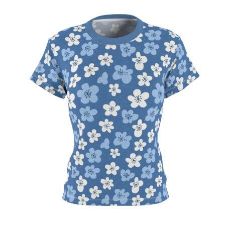 Blue and white flowers cover this seamless pattern tee, scattered across a solid blue background with a textured appearance.