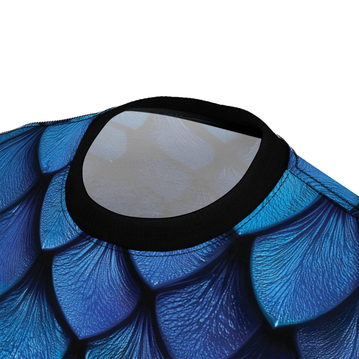 Deep blue scales cover this all over print apparel, detailed with intricate vein-like textures and dark shadows.