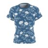 White peony flowers and branches cover this seamless pattern tee, with a blue background and delicate leaves.